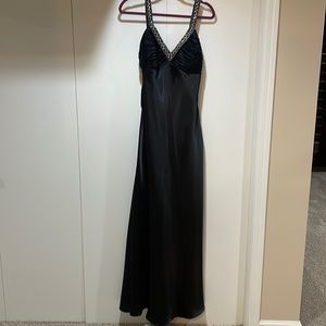 Full length, lined, 100% polyester, side zipper